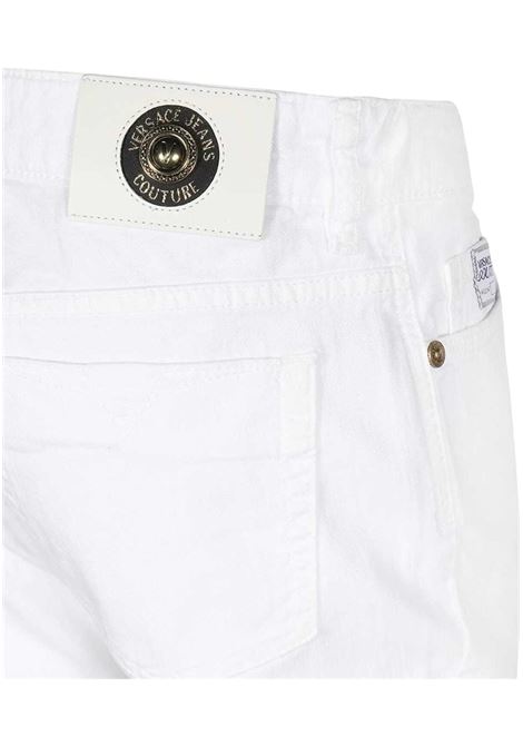 JEANS SLIM CON RICAMO LOGO VERSACE JEANS COUTURE VERSACE JEANS COUTURE | Pantaloni | 74HAB5S0 CEW01003